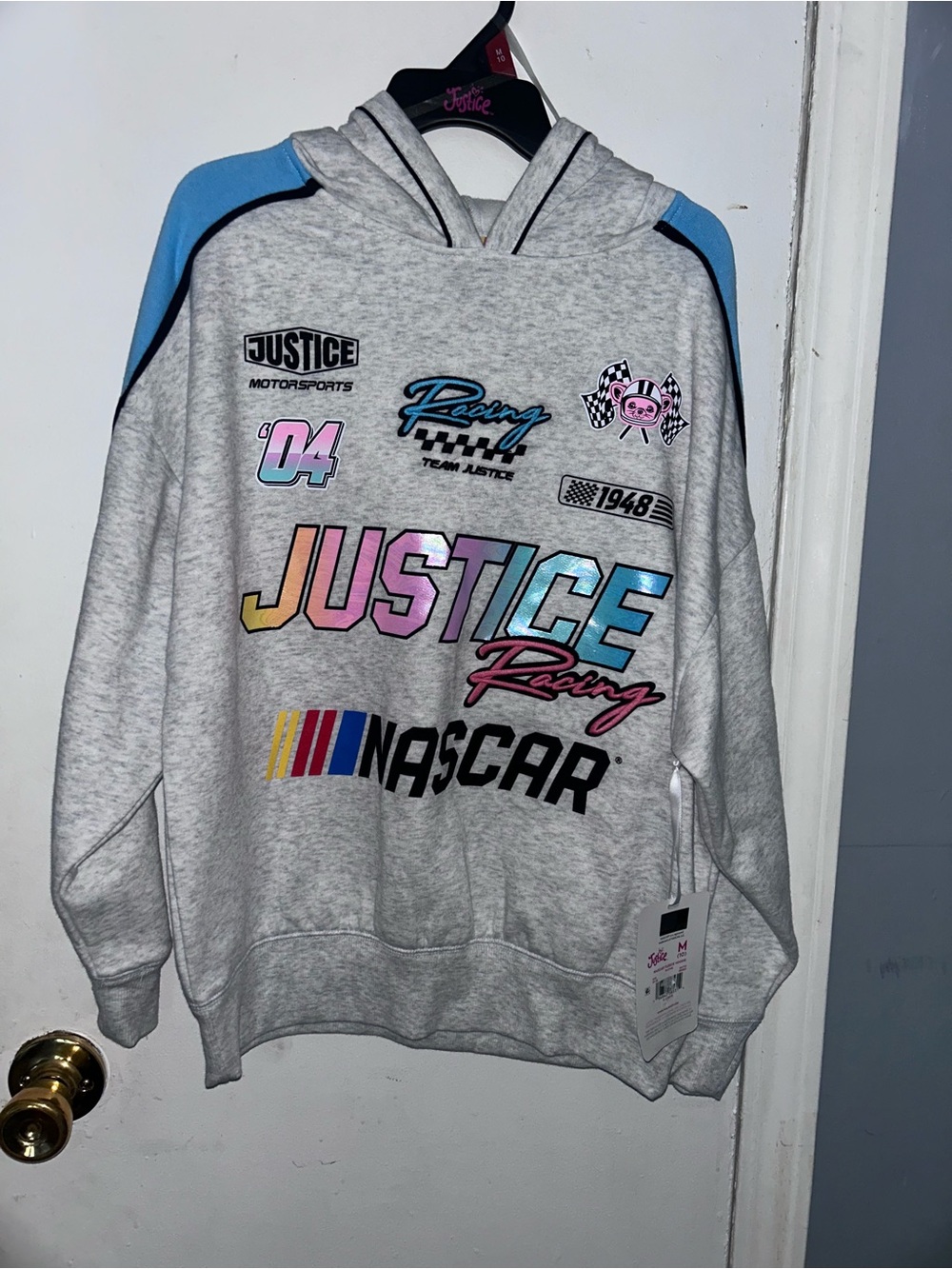 Justice Gray Hoodie with Blue Shoulder Panels and Multicolor Racing Graphics